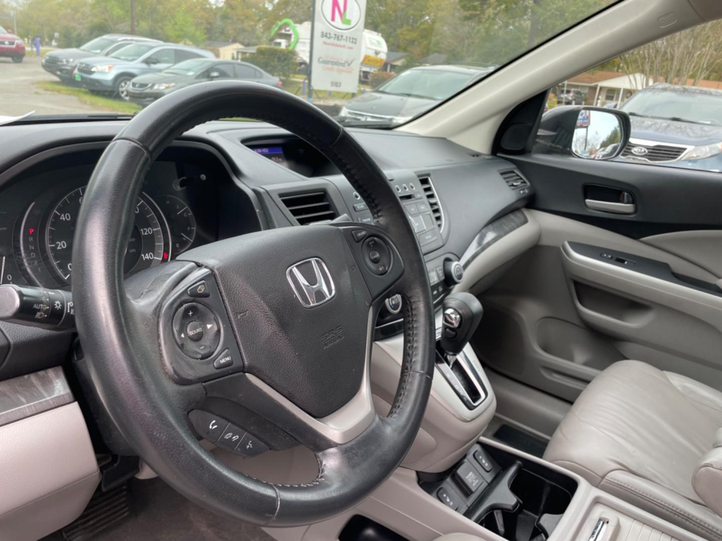 2014 GRAY HONDA CR-V EX-L (2HKRM3H73EH) with an 2.4L engine, Automatic transmission, located at 5103 Dorchester Rd., Charleston, SC, 29418-5607, (843) 767-1122, 36.245171, -115.228050 - Clean interior with Leather, Sunroof, Backup Camera, 6-Disc CD/AUX/Sat, Hands-free Phone, Dual Climate Control, Power Everything (windows, locks, seats, mirrors), Heated Seats, Keyless Entry, Alloy Wheels. Local Trade-in!! 188k miles Located at New Life Auto Sales! 2023 WINNER for Post & Courier's - Photo#20